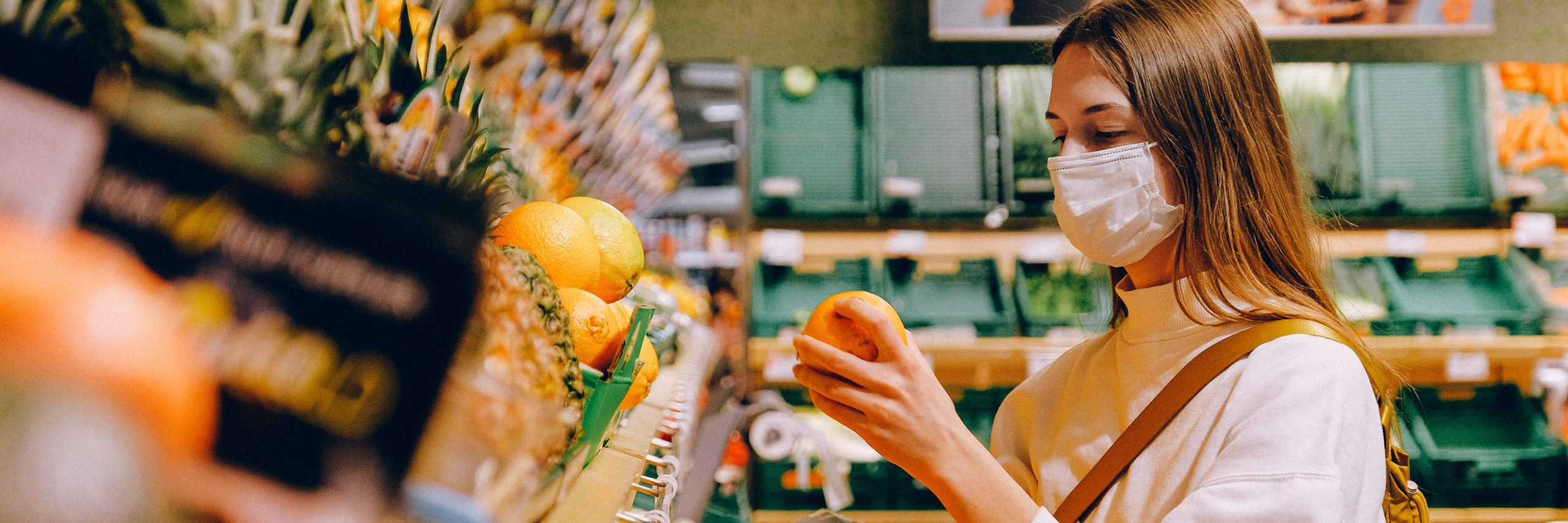 woman covid coronavirus face mask supermarket