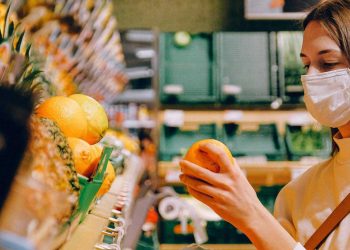 woman covid coronavirus face mask supermarket